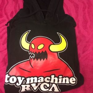 black sweater with a red monster bull